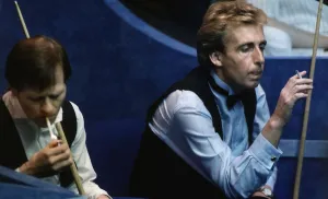 Terry Griffiths Snooker and Alex Higgins during a Snooker match both in their seats Terry Griffiths Snooker and Alex Higgins during a Snooker match both in their seats