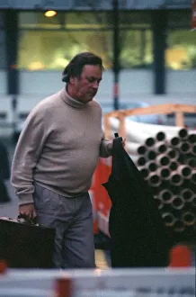 Terry Wogan TV Presenter December 98 Outside BBC studio in london carrying jacket Terry Wogan TV Presenter December 98 Outside BBC studio in london carrying jacket