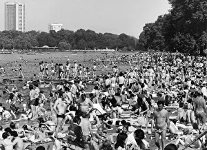 Thousands of sunbathers flocked to The Serpentine in London's Hyde Park today Thousands of sunbathers flocked to The Serpentine in London's Hyde Park today