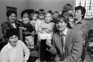 Three-year-old Phillip Auckland presents a £50 cheque from Denby Dale Mothers' Three-year-old Phillip Auckland presents a £50 cheque from Denby Dale Mothers'