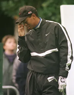 Tiger Woods in some discomfort from flu October 1998 during his practice round Tiger Woods in some discomfort from flu October 1998 during his practice round