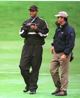 Tiger Woods watches his swing on video October 1998 during his practice round in Tiger Woods watches his swing on video October 1998 during his practice round in