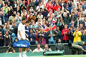 Tim Henman (Great Britain - in blue tracksuit top) and Richard Krajicek Tim Henman (Great Britain - in blue tracksuit top) and Richard Krajicek