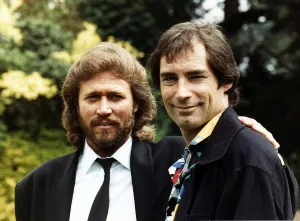 Timothy Dalton actor with singer Barry Gibb - July 1988 Timothy Dalton actor with singer Barry Gibb - July 1988