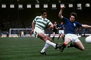 Tom Forsyth of Rangers slides in to try and block a shot by Paul Wilson of Celtic during Tom Forsyth of Rangers slides in to try and block a shot by Paul Wilson of Celtic during