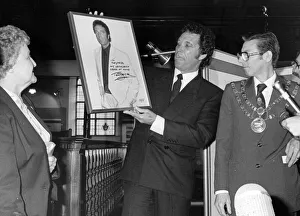 Tom Jones presents his photograph to the Pontypridd Historical Tom Jones presents his photograph to the Pontypridd Historical