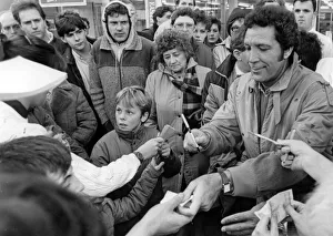 Tom Jones in Taff Street, Pontypridd, filming his TV show. 3rd December 1987 Tom Jones in Taff Street, Pontypridd, filming his TV show. 3rd December 1987