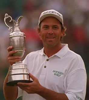Tom Lehman holds claret jug trophy British Open golf champion Lytham Dockers cap Tom Lehman holds claret jug trophy British Open golf champion Lytham Dockers cap