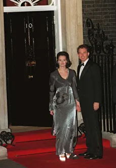 Tony Blair and his wife Cherie Blair outside number Ten Downing Street on their way to Tony Blair and his wife Cherie Blair outside number Ten Downing Street on their way to