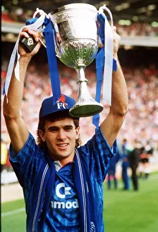 Tony Dorigo Football player for Chelsea holds up the ZDS Zenith Data Systems Trophy at Tony Dorigo Football player for Chelsea holds up the ZDS Zenith Data Systems Trophy at