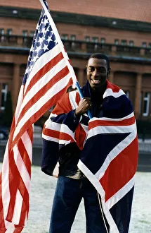 Tony Jarrett athlete runner with American and British flags at Kelvin Hall Glasgow Tony Jarrett athlete runner with American and British flags at Kelvin Hall Glasgow