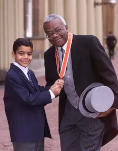 TREVOR McDONALD NOVEMBER 1999 WITH SON JACK AFTER BEING KNIGHTED AT BUCKINGHAM TREVOR McDONALD NOVEMBER 1999 WITH SON JACK AFTER BEING KNIGHTED AT BUCKINGHAM