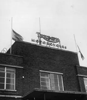 TRIUMPH 2 PICKETS FLY FLAGS AT HALF MAST, , , TO SHOW THAT TRIUMPH IS NOT DEAD YET TRIUMPH 2 PICKETS FLY FLAGS AT HALF MAST, , , TO SHOW THAT TRIUMPH IS NOT DEAD YET