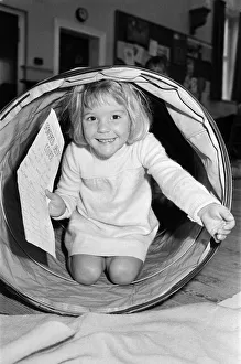 Tunnelling for sponsorship cash is four-year old Helen Copley who took part in an Tunnelling for sponsorship cash is four-year old Helen Copley who took part in an