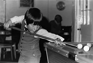 The Tuxedo Kid 8 year old Mark Kiernan seen here at the pool table. 25th September 1984 The Tuxedo Kid 8 year old Mark Kiernan seen here at the pool table. 25th September 1984