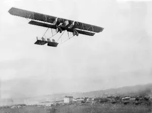 A twin engined Caudron biplane in flight over Salonika in the Balkans during World War A twin engined Caudron biplane in flight over Salonika in the Balkans during World War