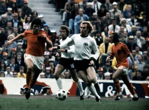 Uli Hoeness West Germany is tackled by Hollands Van Hanegem in the 1974 World Cup Final Uli Hoeness West Germany is tackled by Hollands Van Hanegem in the 1974 World Cup Final