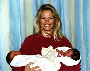 Ulrika Jonsson TV Presenter holding 2 babies Shaquelle Didson and Eleanor Louise Albury Ulrika Jonsson TV Presenter holding 2 babies Shaquelle Didson and Eleanor Louise Albury