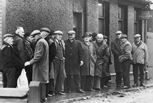 Unemployed miners pictured queuing at the dole at Rhos employment exchange after Unemployed miners pictured queuing at the dole at Rhos employment exchange after