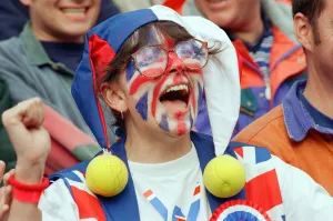 A Union Jack Face Painted fan of Tim Henman support the English tennis player during his A Union Jack Face Painted fan of Tim Henman support the English tennis player during his
