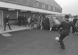 Images Dated 10th December 1972: An unusual spot for a little spontaneous soccer - the forecourt of Hewin