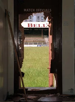 A view through a battered doorway of the stand at Kilbowie Park A view through a battered doorway of the stand at Kilbowie Park