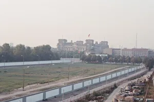 View of West Berlin across wall from East Berlin, showing The Brandenburg Gate & The View of West Berlin across wall from East Berlin, showing The Brandenburg Gate & The