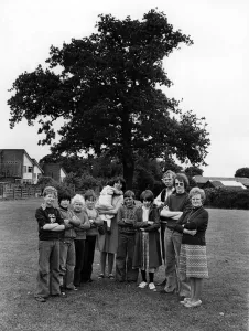 Villagers at Cronton guarding a 150 year old tree. Confusion between the local Parish Villagers at Cronton guarding a 150 year old tree. Confusion between the local Parish