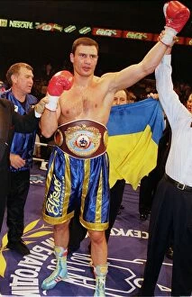 Images Dated 26th June 1999: Vitali klitschko with arm in the air after knocking out britians Herbie Hide in two