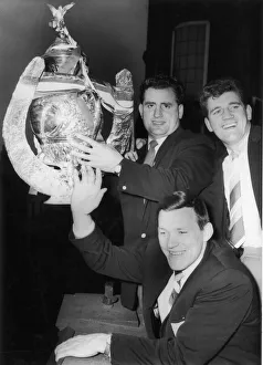 Wakefield Trinitys Captain D Turner, Albert Firth and Neil Fox hold the trophy aloft for Wakefield Trinitys Captain D Turner, Albert Firth and Neil Fox hold the trophy aloft for