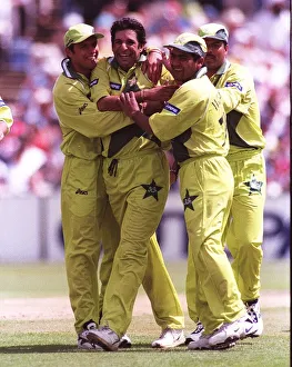 Wasim Akram is mobbed after getting the wicket June 1999 of Craig McMillan during Wasim Akram is mobbed after getting the wicket June 1999 of Craig McMillan during