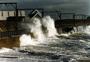 Waves crash against a wall at Solcots after heavy winds caused the sea to become rough Waves crash against a wall at Solcots after heavy winds caused the sea to become rough