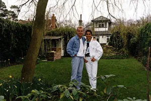 Wayne Dobson Magician with Wife Karen Dobson in rear garden of cottage Dbase A© Wayne Dobson Magician with Wife Karen Dobson in rear garden of cottage Dbase A©
