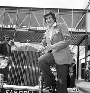 Wayne Newton looking very happy as he leans against a gleaming Rolls-Royce on his arrival Wayne Newton looking very happy as he leans against a gleaming Rolls-Royce on his arrival