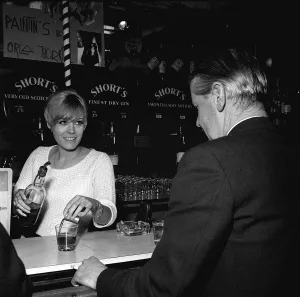 Wendy Richard Actress Model aged 19 years old May 1966 serving behind a bar near Wendy Richard Actress Model aged 19 years old May 1966 serving behind a bar near
