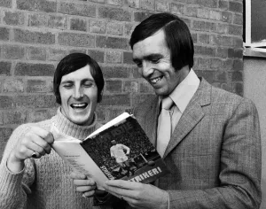 West Bromwich Albion players Jeff Astle and Tony Brown look through Jeff Astle' West Bromwich Albion players Jeff Astle and Tony Brown look through Jeff Astle'