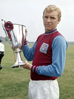 West Ham United captain Bobby Moore holds the European Cup Winners Cup trophy West Ham United captain Bobby Moore holds the European Cup Winners Cup trophy