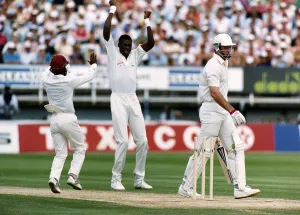 West Indies bowler Curtly Ambrose celebrates after taking the wicket of England batsman West Indies bowler Curtly Ambrose celebrates after taking the wicket of England batsman