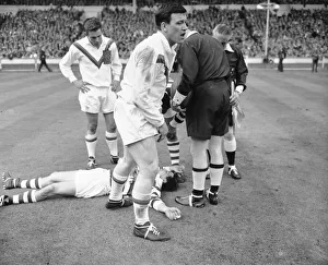 Wigan full back Bolton lies on the ground concussed after the half time whistle had blown Wigan full back Bolton lies on the ground concussed after the half time whistle had blown