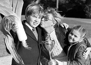 William Marley is a prize leek grower at 12 year ols and gets a kiss from his mum, Mary William Marley is a prize leek grower at 12 year ols and gets a kiss from his mum, Mary