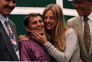 Willie Carwson Jockey wearing purple silks is hugged by Model Susan Mizzi as TV Willie Carwson Jockey wearing purple silks is hugged by Model Susan Mizzi as TV