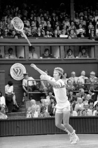 Wimbledon 1981. John McEnroe throws his racket in the air. July 1981 81-3764-058 Wimbledon 1981. John McEnroe throws his racket in the air. July 1981 81-3764-058