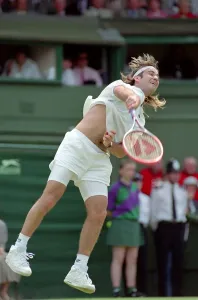 Wimbledon Tennis. Andre Agassi in action. July 1991 91-4218-004 Wimbledon Tennis. Andre Agassi in action. July 1991 91-4218-004