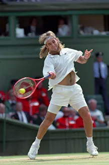 Wimbledon Tennis. Andre Agassi in action. July 1991 91-4218-002 Wimbledon Tennis. Andre Agassi in action. July 1991 91-4218-002