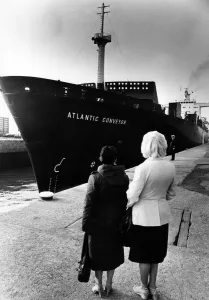 Two wives watch as the The Atlantic Conveyor, a British merchant navy ship Two wives watch as the The Atlantic Conveyor, a British merchant navy ship