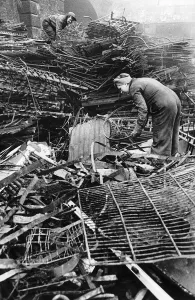 Women scrap locators from the Ministry of Works prepare metal for recycling. WW2 Women scrap locators from the Ministry of Works prepare metal for recycling. WW2