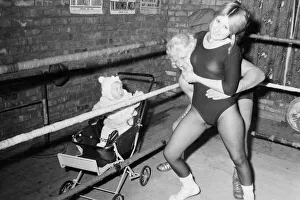 Women wrestlers Sybil Bowker gives her coach Bobby Barron a gripping time as 14 month Women wrestlers Sybil Bowker gives her coach Bobby Barron a gripping time as 14 month