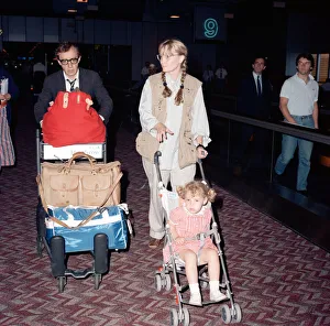 Woody Allen and his partner, actress Mia Farrow, with some of their children at London Woody Allen and his partner, actress Mia Farrow, with some of their children at London