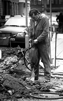 A workman on the 6th March 1989 using a pneumatic drill A workman on the 6th March 1989 using a pneumatic drill