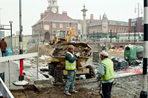 Workmen try to beat the freezing weather, before daytime work on Stockton High Street Workmen try to beat the freezing weather, before daytime work on Stockton High Street